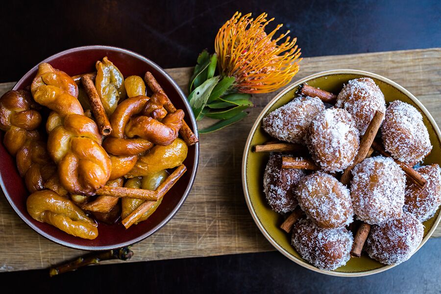 Fine dining cuisine of local foods at the VA waterfront in Cape Town while on a private golf and safari tour through South Africa.