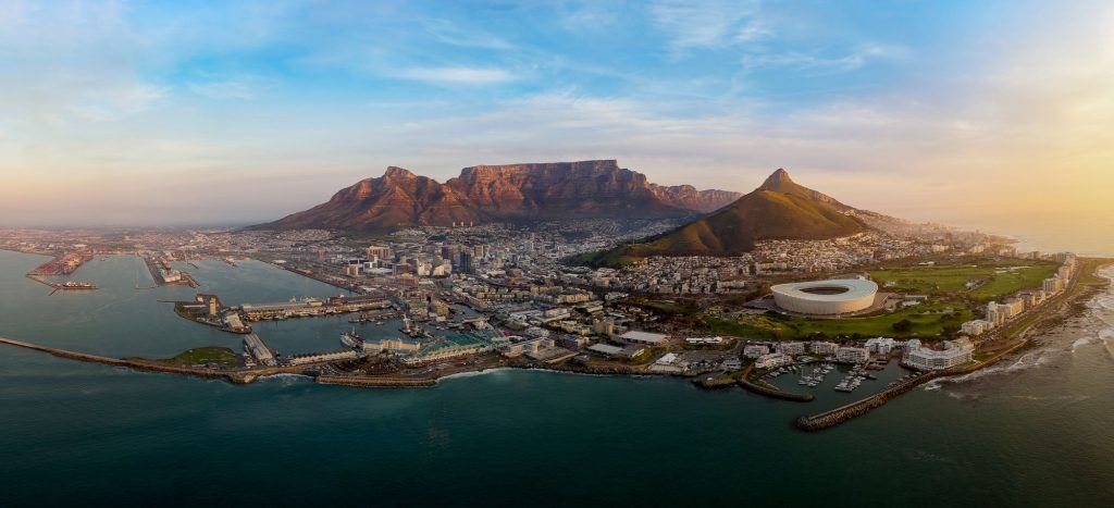 Sightseeing Cape Town and Table Mountain from a private helicopter ride while on luxury safari with Premier Africa