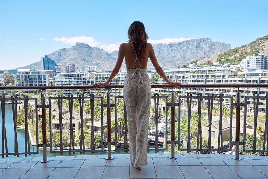 Sightseeing Table Mountain in Cape Town from balcony of luxury accommodation while on luxury safari with Premier Africa