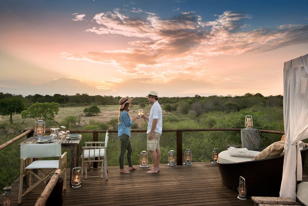 Sundowners on deck in the bush on a luxury Golf and Safari South Africa Romantic Getaway