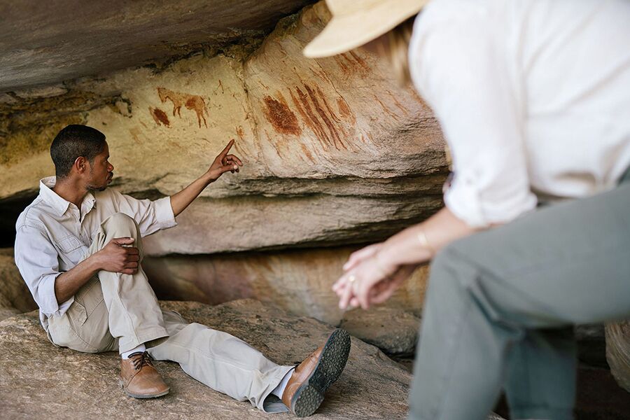 Sightseeing Ancient Caveman Rock Art in South Africa while on luxury safari with Premier Africa