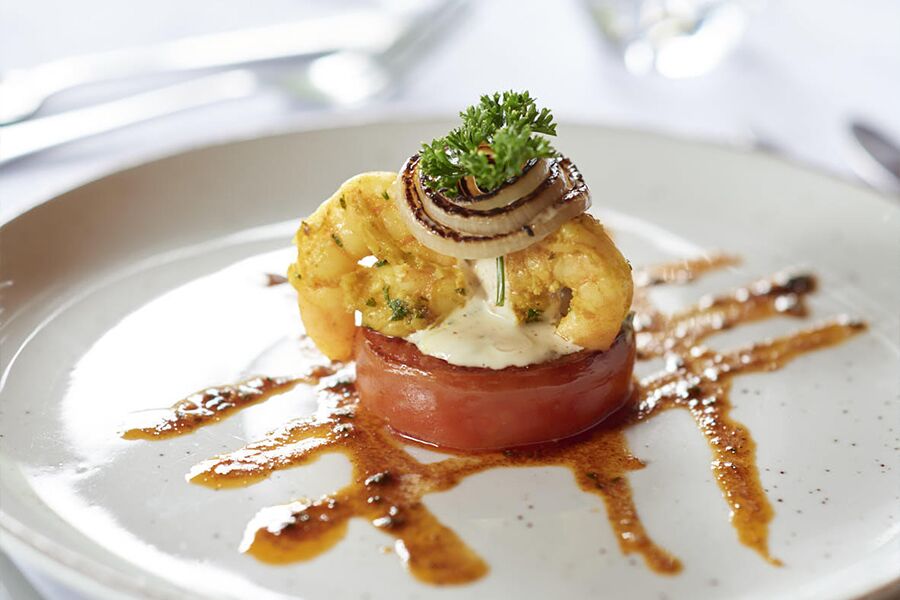 Gourmet lunch at fine dining restaurant while on a luxury safari guided tour in Chobe National Park, Botswana