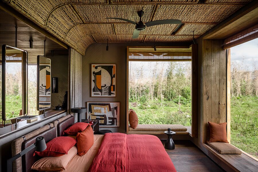 Beautiful bush view from luxury accommodation bedroom while on a luxury safari in Volcanoes National Park.