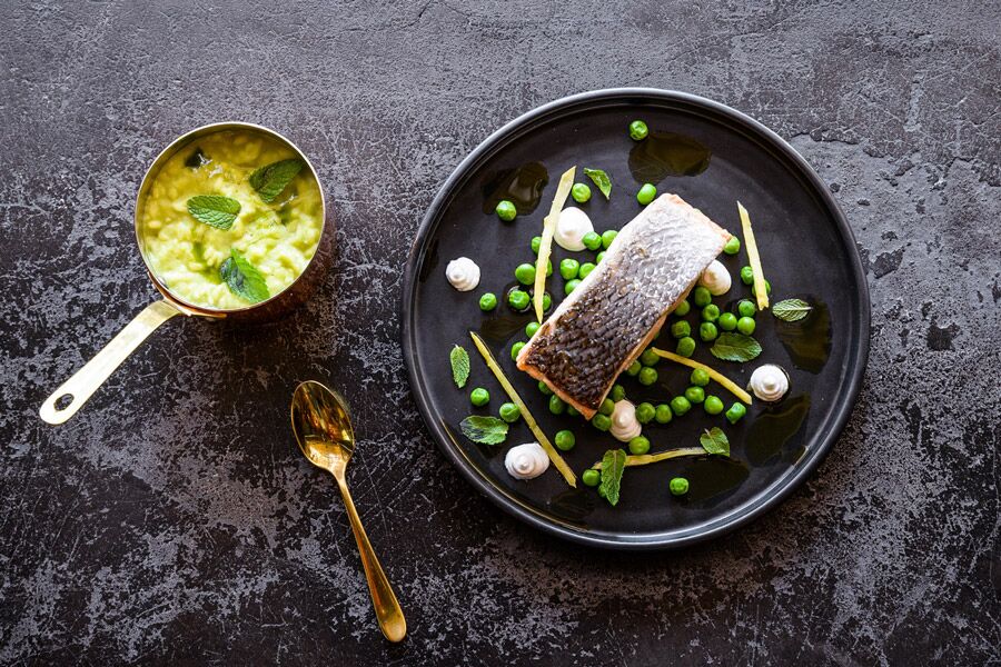 Gourmet cuisine of fish and vegetables at Singita, Luxury Accommodation lodge.