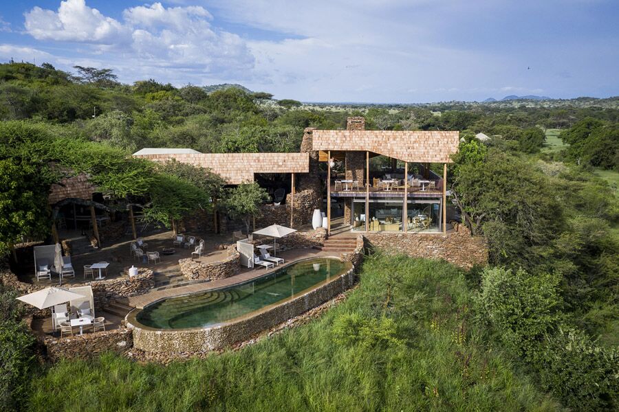 Luxury accommodation with pool area at singita faru faru lodge aerial