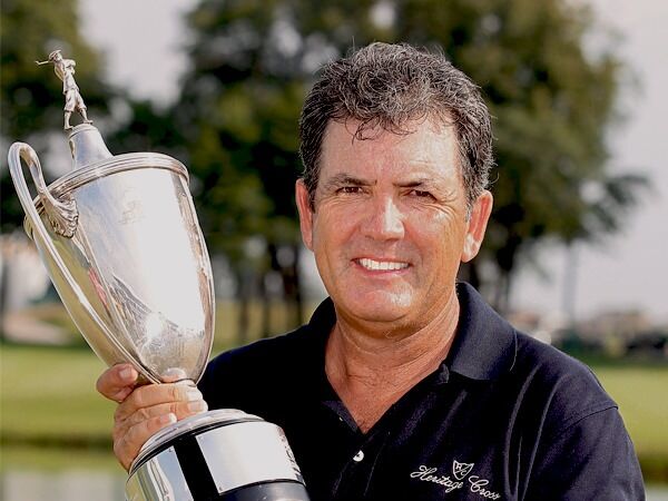 image of David Frost holding a trophy