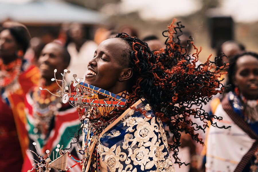 locals dancing for guest on private, luxury tour