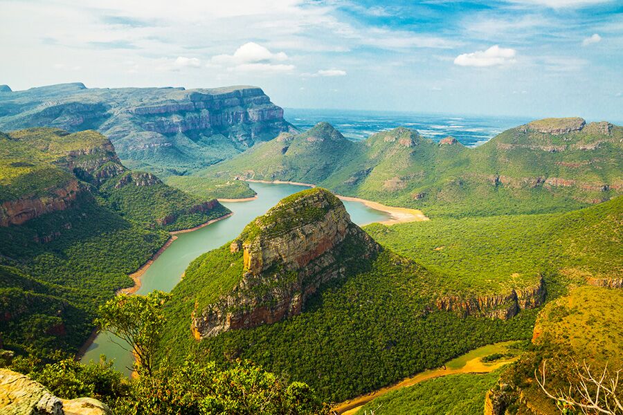 Aerial view over mountains from private charter flight