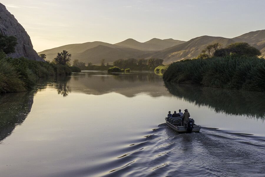 Private boat ride on a river in Kunene which is part of a luxury safari package