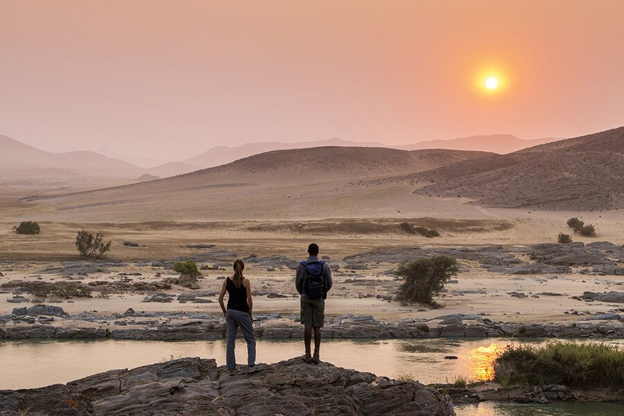 Sightseeing the desert and river in Kunene while on a private guided walk