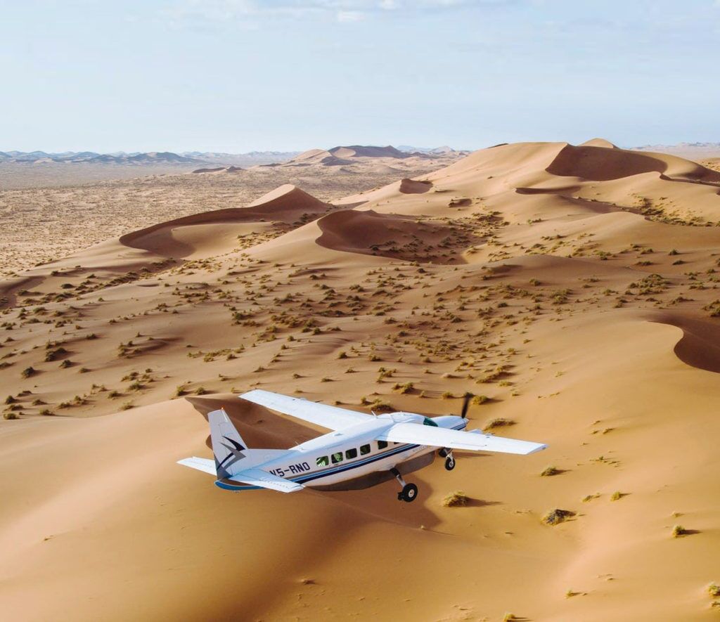 Private charter flight over the dunes in the Sossusvlei, Namibia.